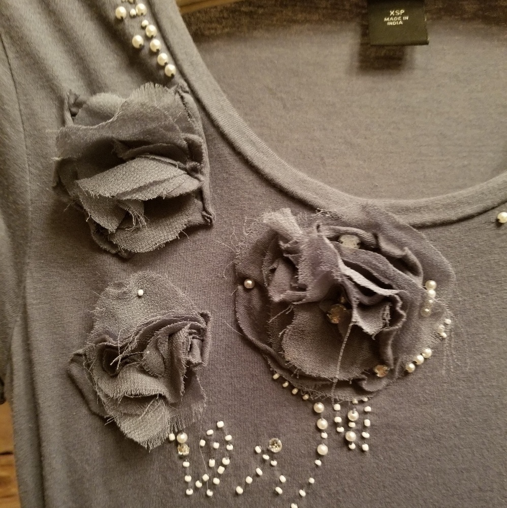 Beaded tee with fabric rosettes